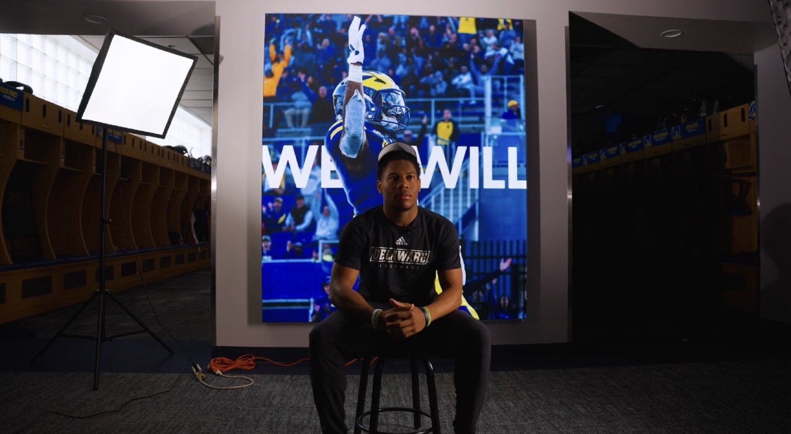 Behind the scenes of a video interview shoot in the Delaware football locker room